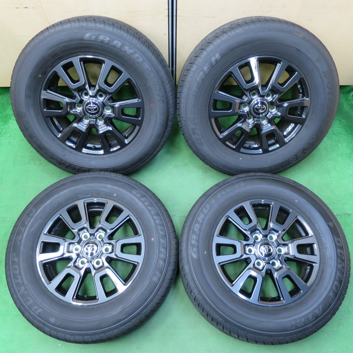 *送料無料* 新車外し！24年★トヨタ ランクル 250 VX 純正 265/65R18 ダンロップ AT23 グラントレック 18インチ PCD139.7/6H★4082401イノ